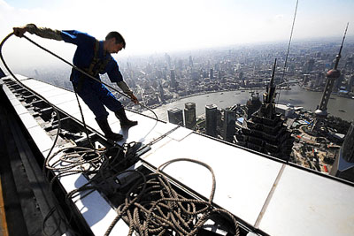 На пороге открытия 101-этажнного Шанхайского Мирового Финансового Центра