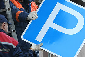 Лужков, парковки, деньги