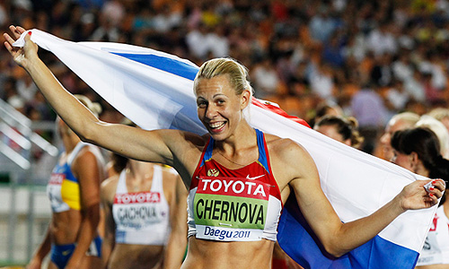 Россиянка Татьяна Чернова, завоевавшая золотую медаль по семиборью, после забега на 800 метров на чемпионате мира по легкой атлетике.