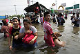 Властям Таиланда, вероятно, потребуется минимум месяц, чтобы ликвидировать последствия наводнения в Бангкоке, сообщила премьер-министр страны Йинглук Чинават.