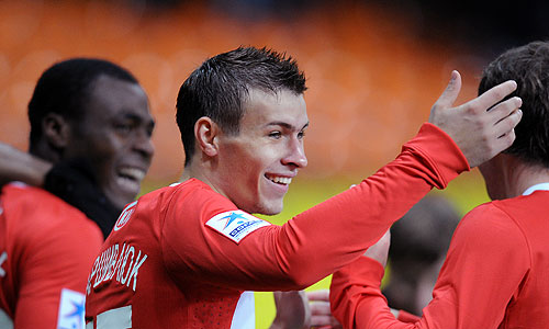 Игроки "Спартака" Эммануэль Эменике, забивший гол, Сергей Паршивлюк и Эйден Макгиди (слева направо) в матче чемпионата России по футболу: "Спартак" (Москва) - "Локомотив" (Москва) - 3:0.