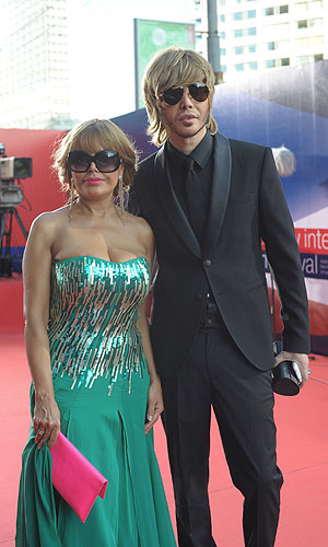 Сергей Зверев со спутницей