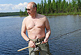 Владимир Путин во время рыбалки в Республике Тыва.