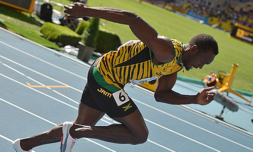 Ямайский спортсмен Усэйн Болт в предварительном забеге на 200 м среди мужчин на чемпионтае мира по легкой атлетике в Москве.