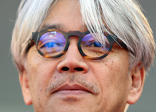 Член жюри Венецианского кинофестиваля композитор и актер Рюити Сакамото.