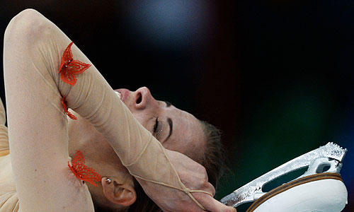 Каролина Костнер (Италия) выступает с короткой программой в женском одиночном катании во время соревнований на VI этапе Гран-при по фигурному катанию в Москве.