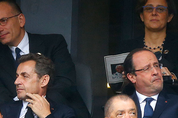 Бывший президент Франции Николя Саркози (слева) и нынешний, Франсуа Олланд (справа).