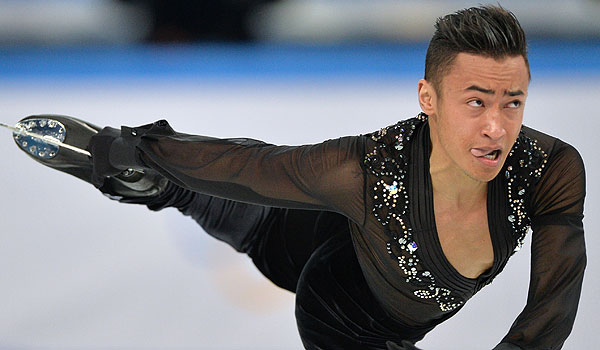 Флоран Амодио (Франция) выступает в короткой программе мужского одиночного катания командных соревнований по фигурному катанию на XXII зимних Олимпийских играх в Сочи.