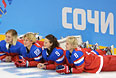 Слева направо: Юлия Лескина, Екатерина Смолина, Александра Вафина, Лия Гаврилова (Россия) во время фотосессии женской сборной России по хоккею перед тренировкой на XXII зимних Олимпийских играх в Сочи.