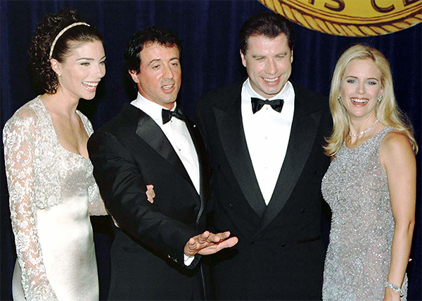 Джон Траволта и Сильвестр Сталлоне с супругами. 1997 год.