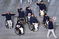Представители Японии во время парада атлетов и членов национальных делегаций на церемонии открытия XI зимних Паралимпийских игр в Сочи.