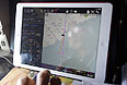 Карта маршрутов поиска самолета Boeing-777 Malaysia Airlines на экране iPad.
