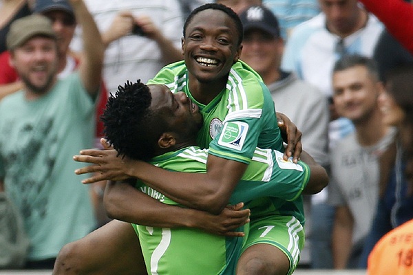 Нападающий московского ЦСКА и сборной Нигерии Ахмед Муса (сверху) забил два гола в ворота команды Аргентины на чемпионате мира в Бразилии.