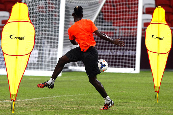Игрок "Ювентуса" Поль Погба тренируется перед товарищеским матчем против Сингапура.