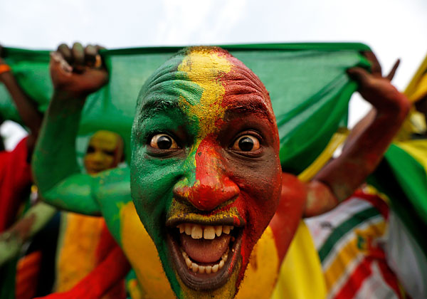 Болельщик сборной Мали перед матчем группы D Кубка африканских наций 2015 против сборной Гвинеи