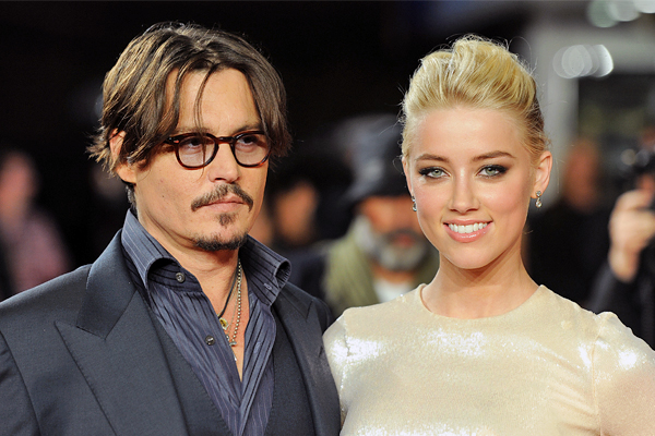 Джонни Депп и Эмбер Херд на лондонской премьере фильма "Ромовый дневник" в 2011 году