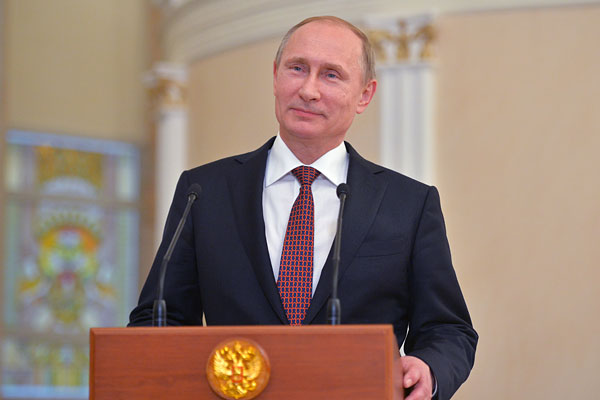 Президент России Владимир Путин во время пресс-конференции по итогам переговоров в "нормандском формате" по урегулированию кризиса на юго-востоке Украины