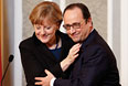 Ангела Меркель и Франсуа Олланд во время пресс-конференции по итогам переговоров в Минске