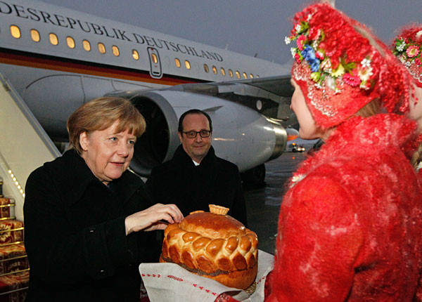 Ангела Меркель и Франсуа Олланд в аэропорту Минска