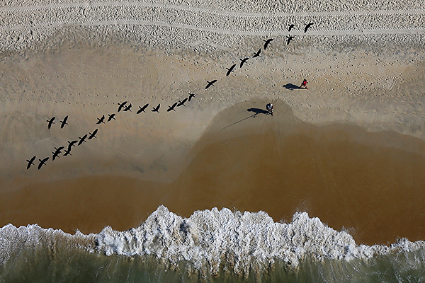 Рыбаки на пляже Сан-Конраду в Рио-де-Жанейро
