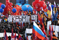 Участники митинга-концерта "Мы вместе", посвященного годовщине присоединения Крыма к России