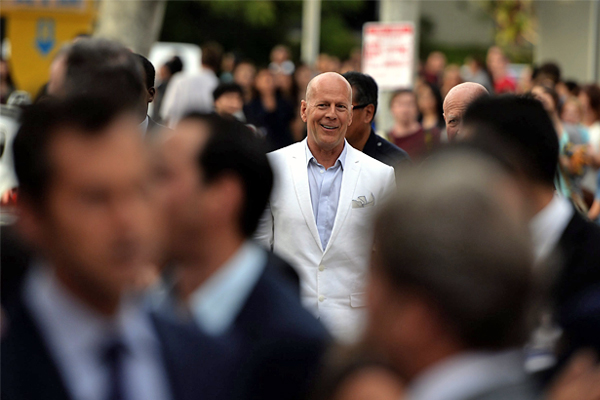 Брюс Уиллис на премьере фильма "РЭД 2" в Лос-Анджелесе, июль 2013 год