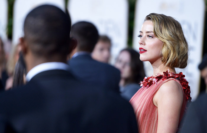 Американская актриса Эмбер Херд на церемонии вручения премии "Золотой Глобус"