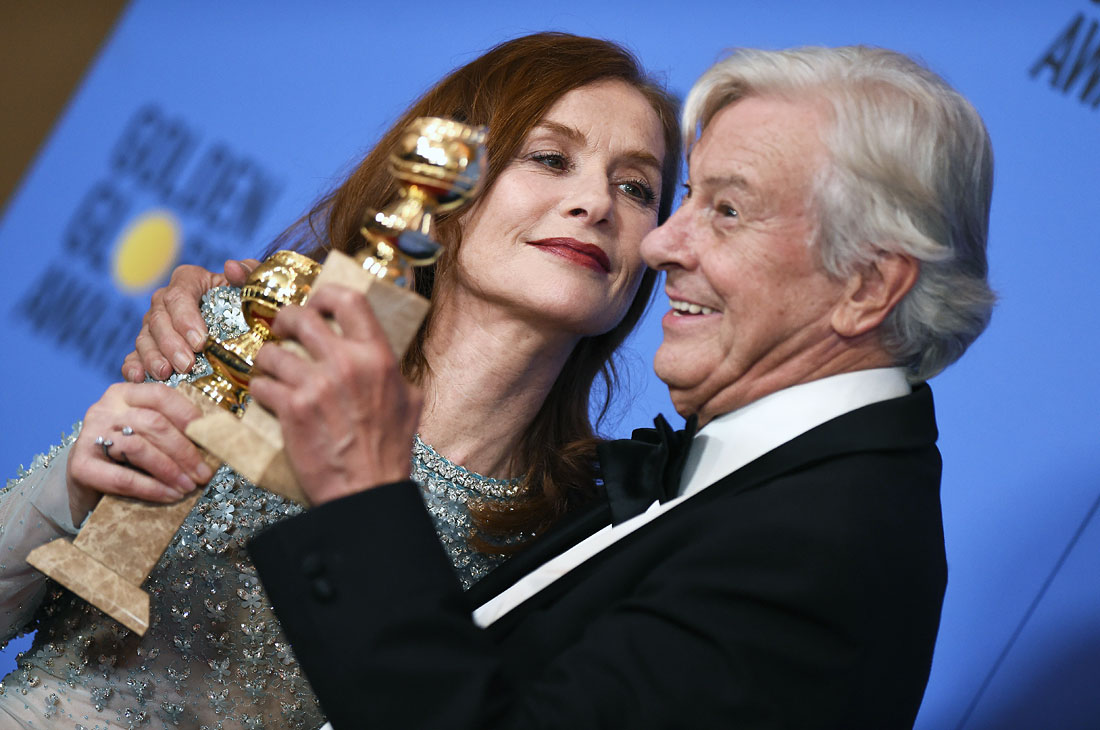 Лучшая драматическая актриса Изабель Юппер и режиссер фильма "Она" Пол Верховен