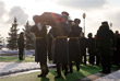 Похороны погибших при крушении самолета Ту-154 на Федеральном военном мемориальном кладбище в подмосковных Мытищах