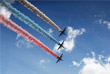 Штурмовики Су-25 раскрашивают небо в цвета российского флага