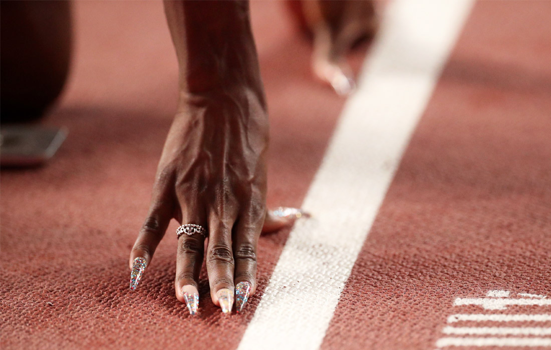 Американская спортсменка Эшли Спенсер во время соревнований в беге на 400 метров с барьерами на чемпионате мира по легкой атлетике, который проходит в Дохе