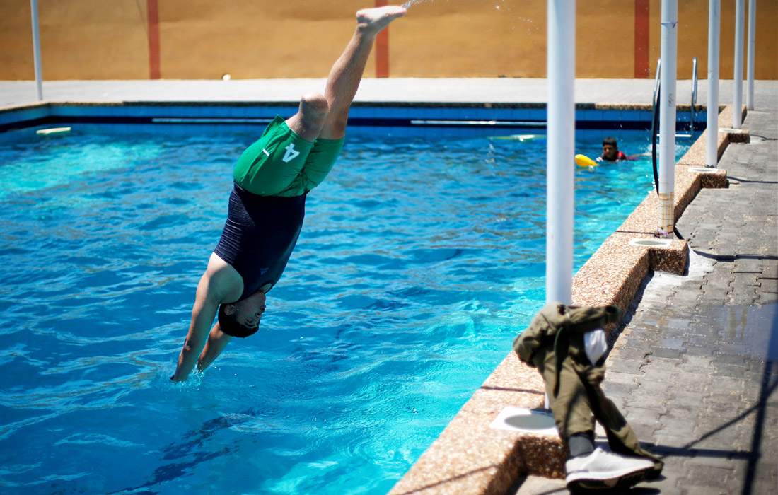 Тренировка по плаванию для людей с ограниченными возможностями в секторе Газа. 29 июля.