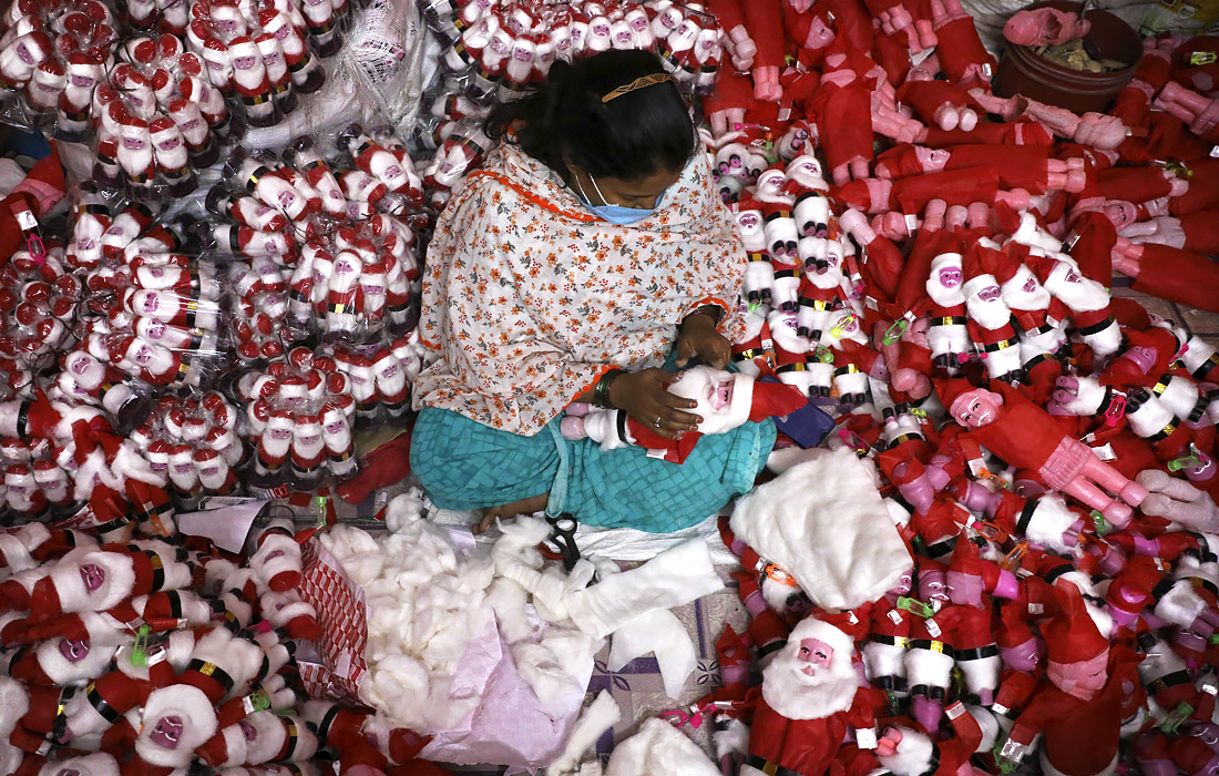 Женщина в мастерской Калькутты, Индия