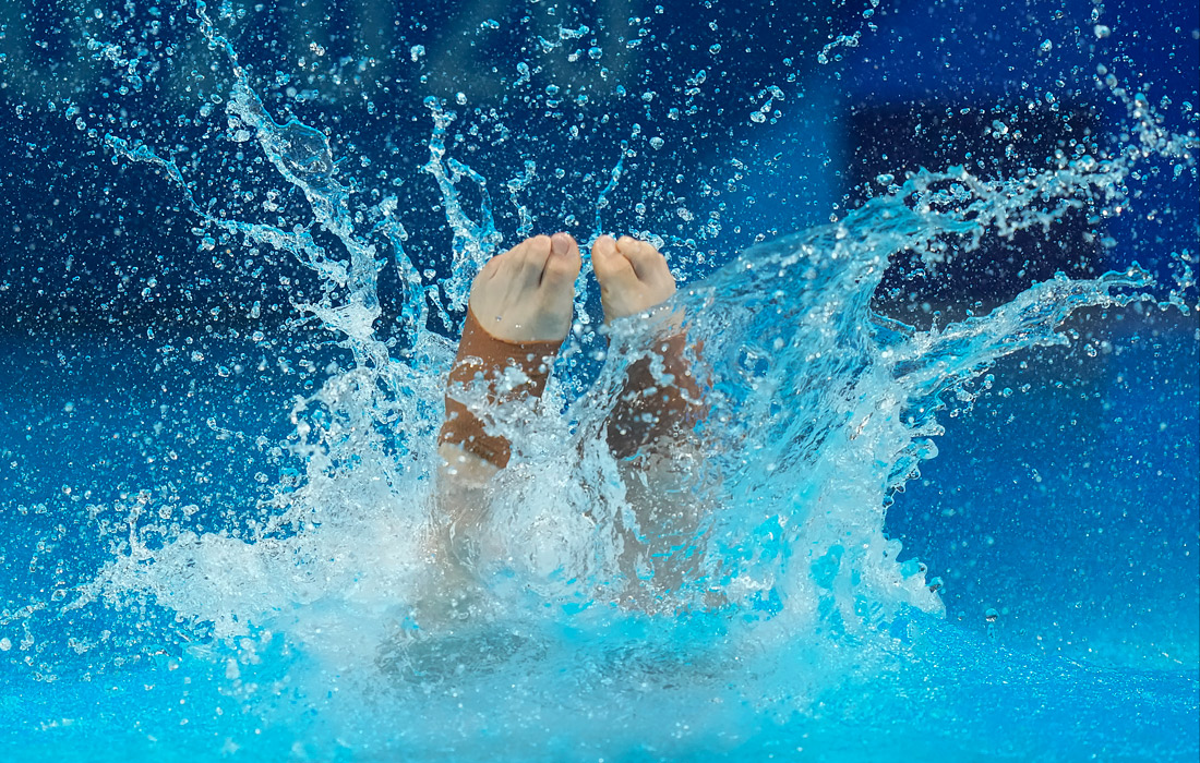 Во время индивидуальных прыжков в воду с трехметрового трамплина