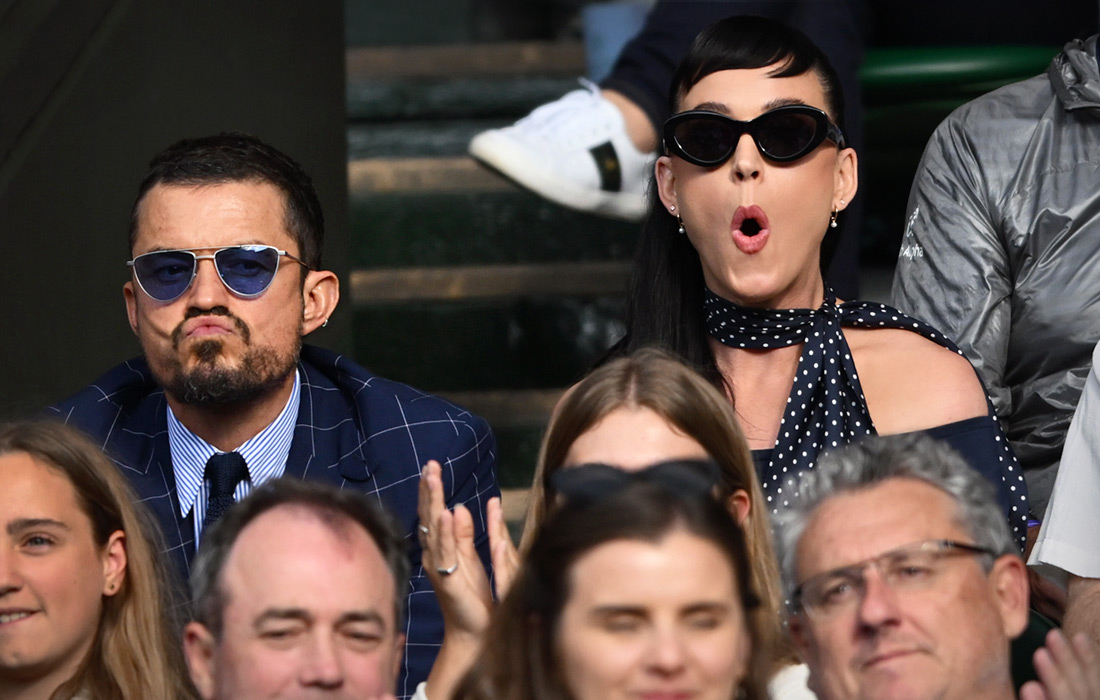 Теннисный турнир привлекает звезд шоу-бизнеса и знаменитых спортсменов на трибуны. На фото: певица Кэти Перри и актер Орландо Блум на третьем дне чемпионата.