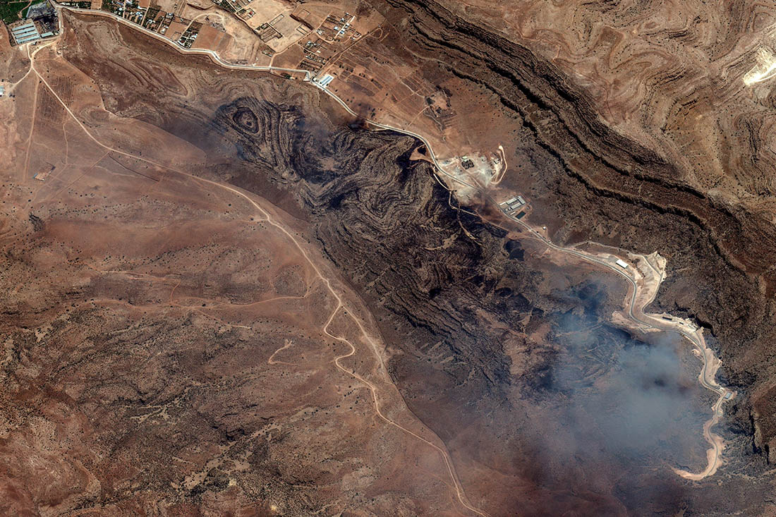 Дым от пожара вокруг ракетного объекта Шираз