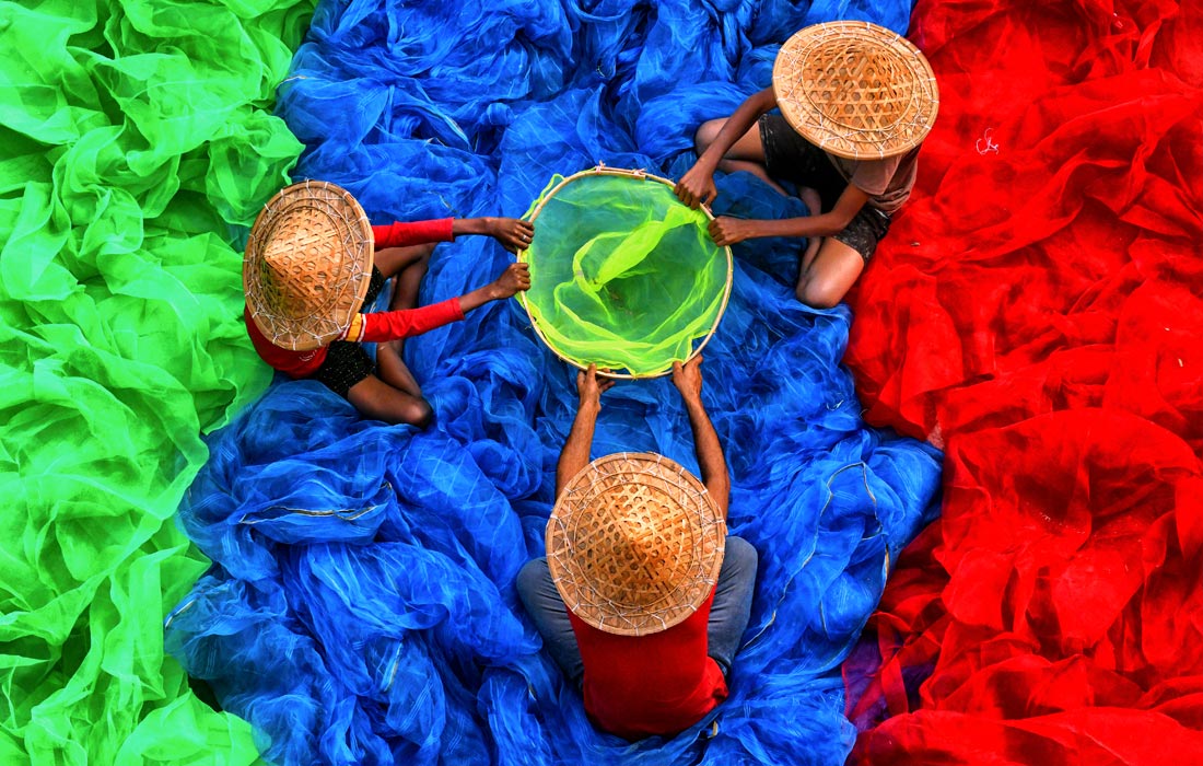 Сортировка рыболовных сетей в индийском Каннинге