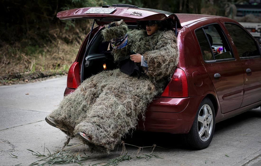 Участник карнавальных торжеств в Арагуа, Венесуэла