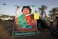 Каддафи ищут место