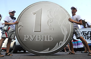 Рубль умеренно укрепился