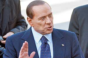 Берлускони приговорили