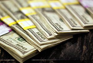 Смерть бумажных долларов откладывается