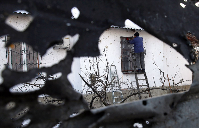 Украинские военные заявили о новых обстрелах своих позиций в Донбассе