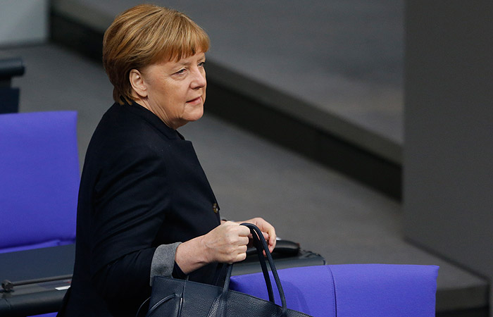 Меркель высказалась за поиск компромисса с Трампом в экономике и военной сфере