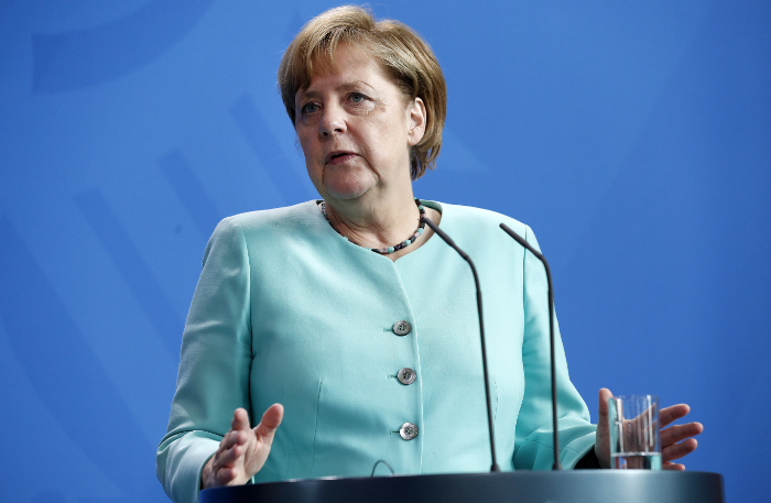 Меркель отказалась выступать посредником между Трампом и Путиным