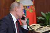 Путин в разговоре с Трампом обсудил Сирию и Украину