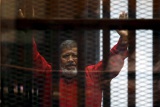 Экс-президент Египта Мурси приговорен к трем годам тюрьмы