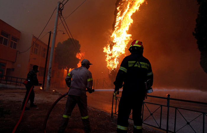 Число жертв лесных пожаров в Греции приблизилось к 50