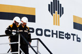 Акции "Роснефти" обвалились к уровням месячной давности из-за кризиса в Венесуэле