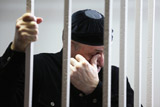 Главу чеченского "Мемориала" приговорили к 4 годам колонии-поселения за хранение наркотиков